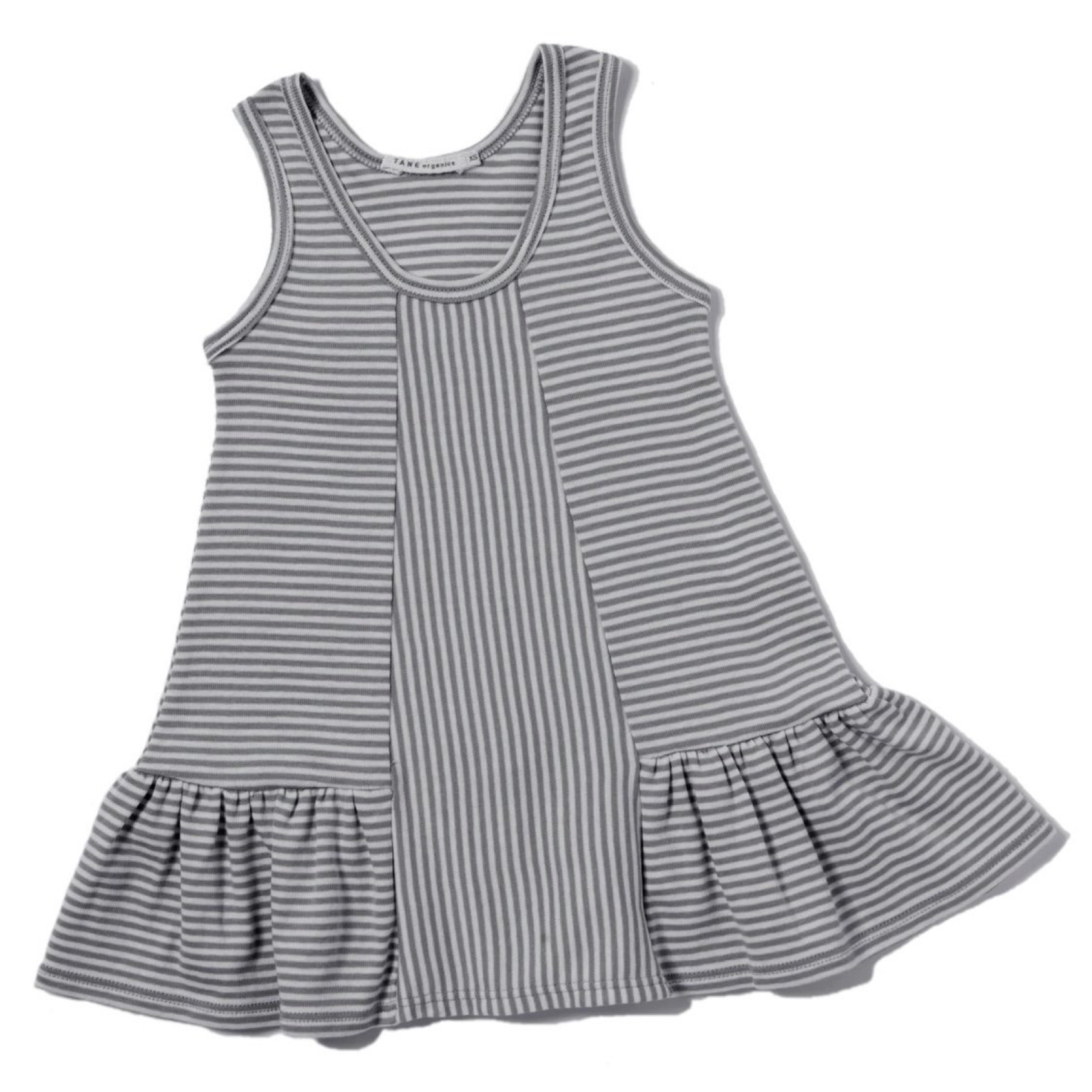 cool grey and cream color petite stripes sleeveless tank dress with ruffles at hem.  Direction play at the center front panel. 100% organic cotton petite stripe knit.